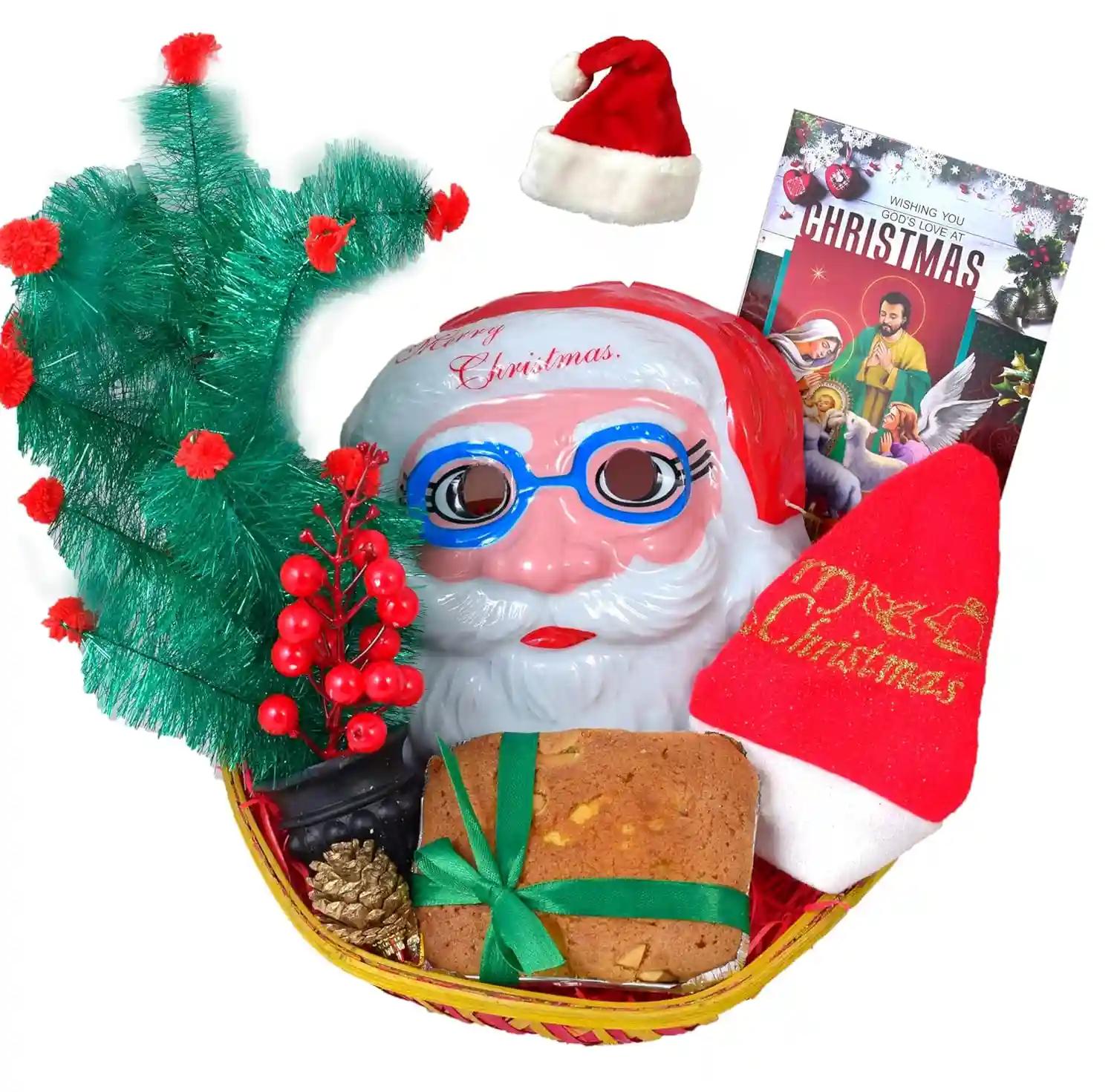 Christmas Gift Hamper/Christmas Cake Gift/Christmas Gift Basket-Decorated Basket+200gms veg plum Cake+Christmas Tree+Santa Claus mask+Santa Claus Cap+Bunch of Decorative Cherry+Pine Cone+Greeting Card