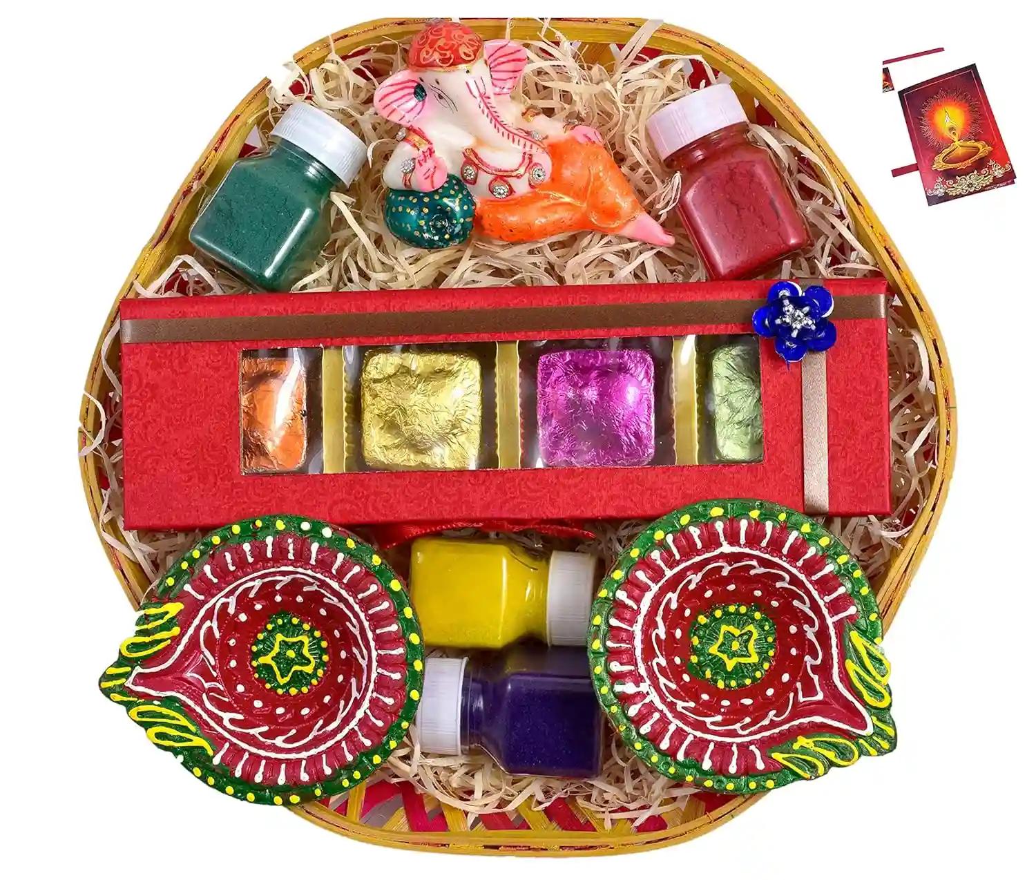 Diwali gift hamper/diwali gift items/diwali chocolate gift hamper/diwali chocolate gift pack/diwali gifts-Handcrafted chocolate box+2 earthern diyas+4 Rangoli Colours+Showpiece figurine+Greeting Card