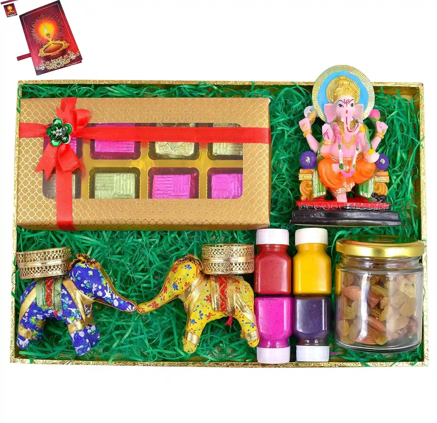 Diwali dry fruits/Diwali dry bruits gift box/Diwali dry fruits box-Decorated Tray+100 gms of mix dry fruits+Chocolate box+Pair of Elephant Shape Candle Holder+showpiece figurine+rangoli colours+Card